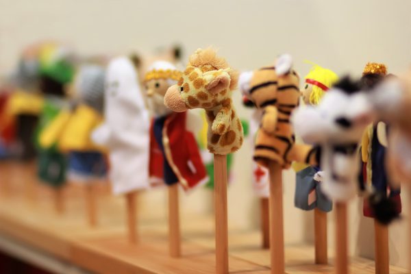 Toy puppets on wooden sticks for preschool nursery theatre. Pupp